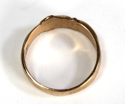 Lot 756 - A 9ct yellow gold buckle ring, Birmingham 1959,...