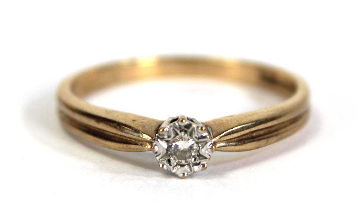 Lot 757 - A 9ct yellow gold ring set small diamond in a...