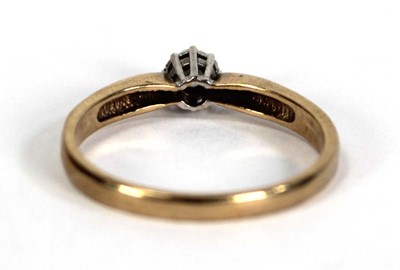 Lot 757 - A 9ct yellow gold ring set small diamond in a...