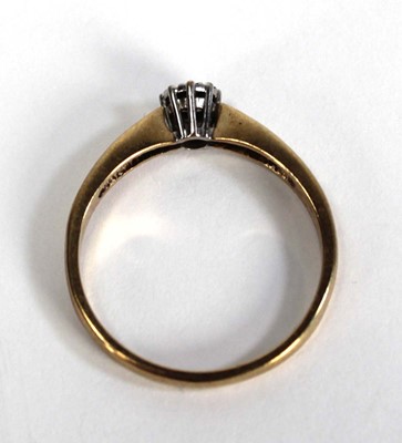 Lot 757 - A 9ct yellow gold ring set small diamond in a...