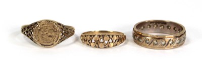 Lot 758 - A 9ct yellow gold eternity ring set paste,...