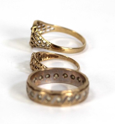 Lot 758 - A 9ct yellow gold eternity ring set paste,...