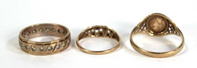 Lot 758 - A 9ct yellow gold eternity ring set paste,...