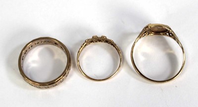 Lot 758 - A 9ct yellow gold eternity ring set paste,...