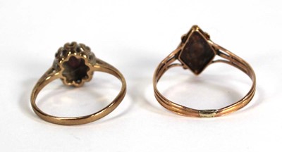 Lot 759 - A 9ct yellow gold cluster ring set small ruby...