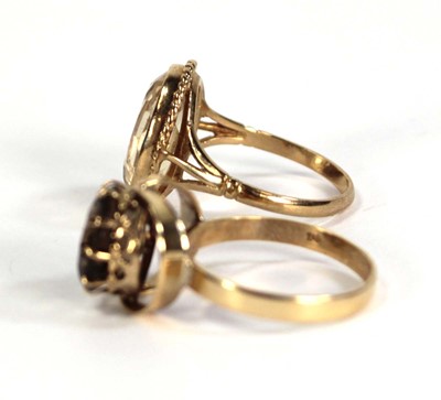 Lot 760 - A 9ct yellow gold ring set smoky quartz, ring...