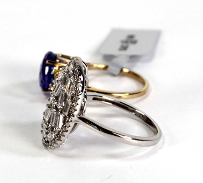 Lot 761 - A 9ct yellow gold ring set tanzanite coloured...