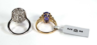 Lot 761 - A 9ct yellow gold ring set tanzanite coloured...