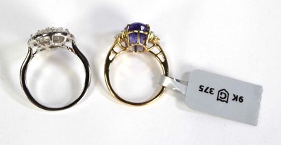 Lot 761 - A 9ct yellow gold ring set tanzanite coloured...