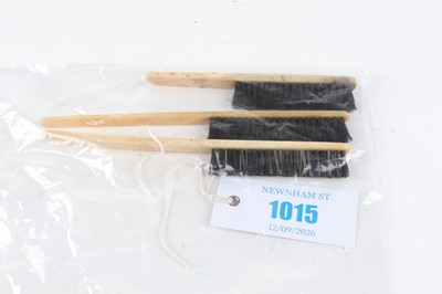 Lot 1015 - Three bone-handled brushes