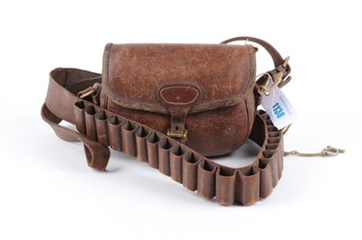 Lot 1138 - Leather cartridge bag and belt