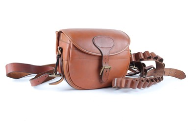 Lot 1108 - Tan leather cartridge bag and belt