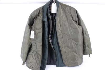 Lot 1204 - Green quilted under-jacket, waxed gilet (XL)...