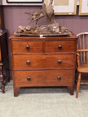 Lot 66 - A mahogany chest of two over two drawers with...