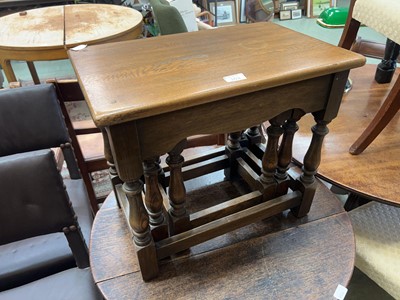 Lot 103 - Nest of three oak tables