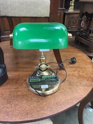 Lot 111 - Brass Bankers lamp with train