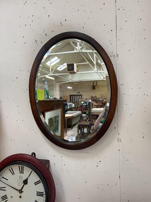 Lot 45 - Bevelled and oak framed glass mirror