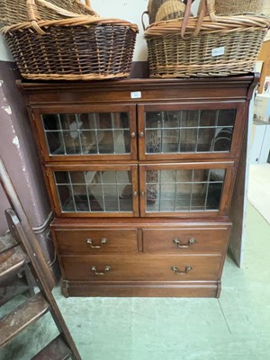 Lot 90 - A Minty four section mahogany cupboard...