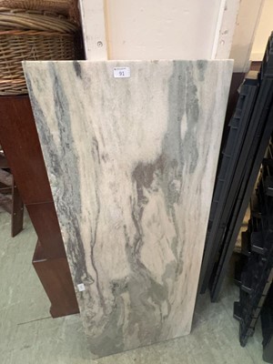 Lot 91 - A slab of polished marble