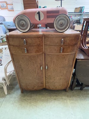 Lot 94 - A bird's eye maple veneer double bow fronted...
