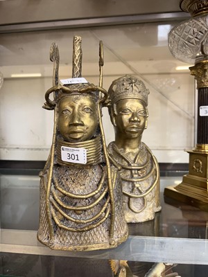 Lot 301 - Two African style brass busts of people