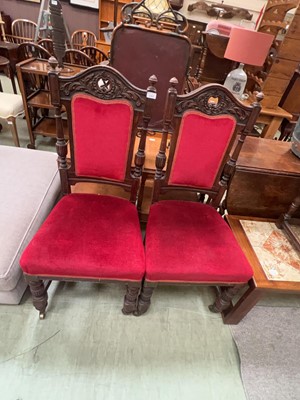 Lot 143 - Two carved oak upholstered dining chairs