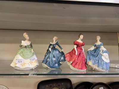 Lot 323 - Four Royal Doulton ladies