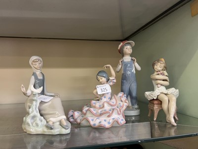 Lot 325 - Four Lladro ceramic figurines in the form of...