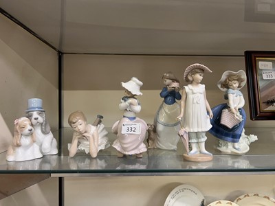Lot 332 - Five Nao ceramic figures of children and...