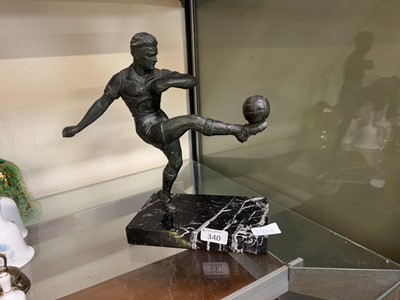 Lot 340 - A patinated metalwork figure of footballer on...