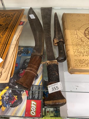 Lot 355 - A hand crafted eastern style dagger along with...