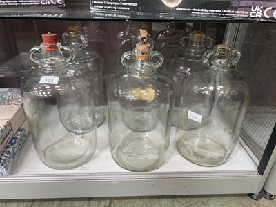 Lot 413 - Six glass demijohns