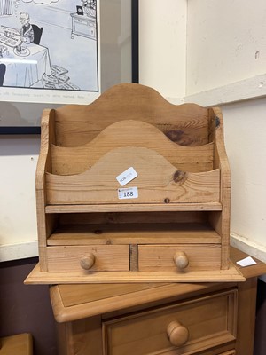Lot 188 - A pine letter rack with drawers under