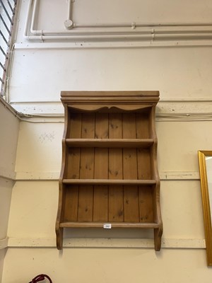 Lot 192 - A pine wall plate rack