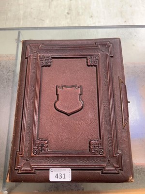 Lot 431 - A vintage photo album with contents