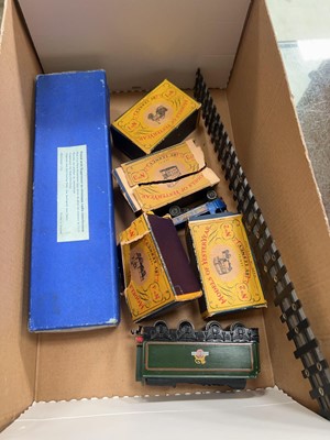 Lot 437 - A small box of assorted model railway items to...