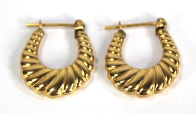 Lot 765 - A pair of 9ct yellow gold ear hoops, l. 1.9 cm,...
