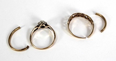 Lot 766 - A 9ct yellow gold Celtic knot design ring, a...