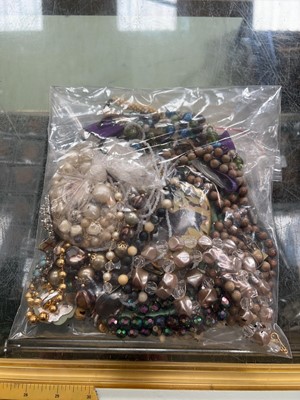 Lot 458 - A bag of assorted costume jewellery to include...