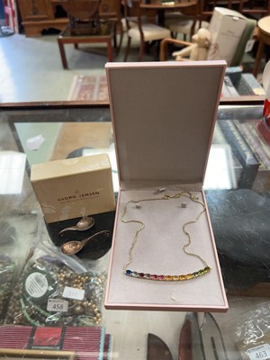 Lot 469 - Two boxes containing necklace and spoons