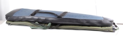 Lot 1358 - Two padded gun slips