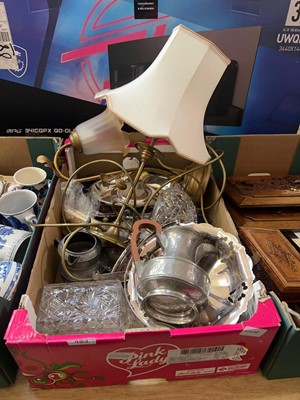 Lot 483 - A tray containing metalware to include lamps,...