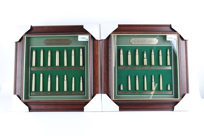 Lot 1106 - A matched pair of framed and glazed display...