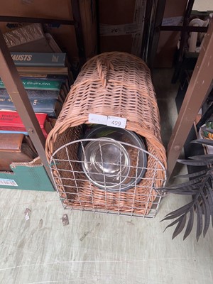 Lot 499 - A wicker pet basket with bowls, etc