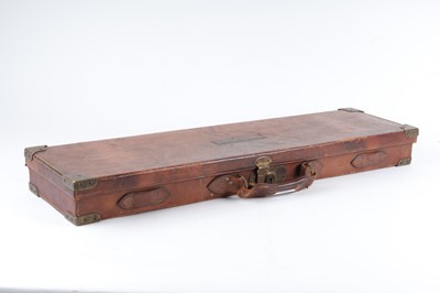 Lot 31 - Leather 20 bore gun case, red baize lined...