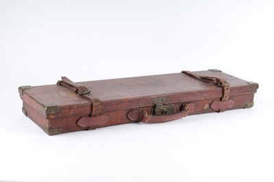 Lot 32 - Leather gun case, green baize lined interior...
