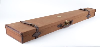 Lot 34 - Canvas and leather rifle case, green baize...