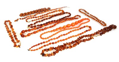 Lot 774 - Ten cognac amber-style and costume necklaces (10)