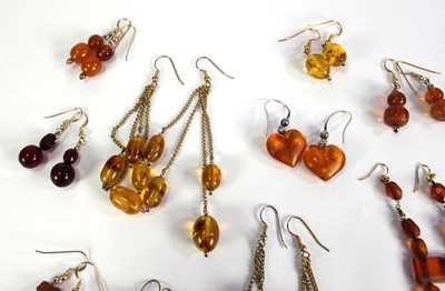 Lot 777 - Thirteen pairs of amber-type ear pendants (13...