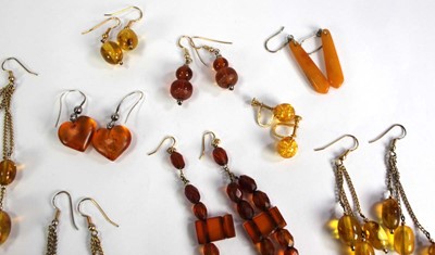 Lot 777 - Thirteen pairs of amber-type ear pendants (13...